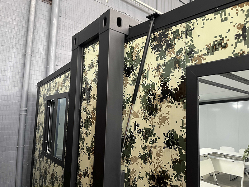 Camouflage small biplane expansion box room